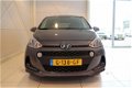 Hyundai i10 - 1.0i 66pk Premium | FULL OPTIONS | INCL. MIDDENARMSTEUN | ALLSEASONBANDEN | €1.849 KOR - 1 - Thumbnail