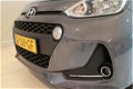 Hyundai i10 - 1.0i 66pk Premium | FULL OPTIONS | INCL. MIDDENARMSTEUN | ALLSEASONBANDEN | €1.849 KOR - 1 - Thumbnail