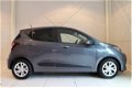 Hyundai i10 - 1.0i 66pk Premium | FULL OPTIONS | INCL. MIDDENARMSTEUN | ALLSEASONBANDEN | €1.849 KOR - 1 - Thumbnail