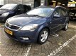 Kia Cee'd Sporty Wagon - 1.4 CVVT Navigator Plus Pack Navigatie airco lm-velgen electrische pakket c - 1 - Thumbnail