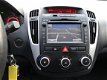 Kia Cee'd Sporty Wagon - 1.4 CVVT Navigator Plus Pack Navigatie airco lm-velgen electrische pakket c - 1 - Thumbnail
