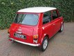 Mini Mini Cooper - 1.3 SPI met nieuwe carrosserie en motor - 1 - Thumbnail