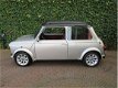 Mini Mini Cooper - 1.3 MPI 40th Anniversary met webasto schuifdak - 1 - Thumbnail