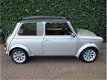 Mini Mini Cooper - 1.3 MPI 40th Anniversary met webasto schuifdak - 1 - Thumbnail