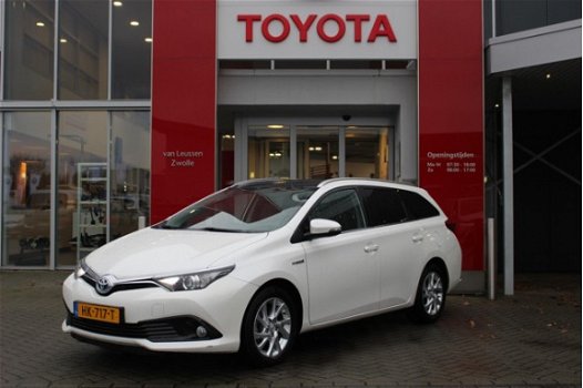 Toyota Auris - 1.8 HYBRID LEASE NL-AUTO 1E EIG NAVI - 1