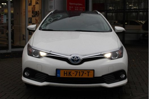 Toyota Auris - 1.8 HYBRID LEASE NL-AUTO 1E EIG NAVI - 1