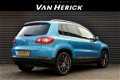 Volkswagen Tiguan - 1.4 TSI Sport&Style 4Motion 150 PK Panoramadak / Navigatie / Nette staat - 1 - Thumbnail