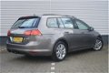 Volkswagen Golf Variant - 1.0TSI/116PK Comfortline Executive · Navigatie · Cruise control · DAB - 1 - Thumbnail