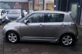 Suzuki Swift - 1.5 Exclusive / Airco / Keyless / Sport / N.A.P - 1 - Thumbnail