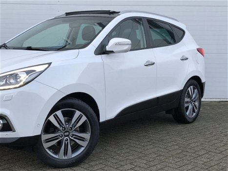 Hyundai ix35 - 2.0i 4WD i-Catcher Automaat RIJKLAAR panoramadak, zwart lederen bekleding, full map n - 1