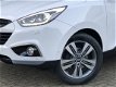 Hyundai ix35 - 2.0i 4WD i-Catcher Automaat RIJKLAAR panoramadak, zwart lederen bekleding, full map n - 1 - Thumbnail