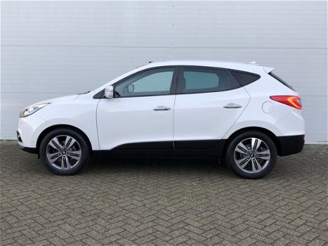 Hyundai ix35 - 2.0i 4WD i-Catcher Automaat RIJKLAAR panoramadak, zwart lederen bekleding, full map n - 1