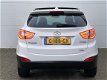 Hyundai ix35 - 2.0i 4WD i-Catcher Automaat RIJKLAAR panoramadak, zwart lederen bekleding, full map n - 1 - Thumbnail