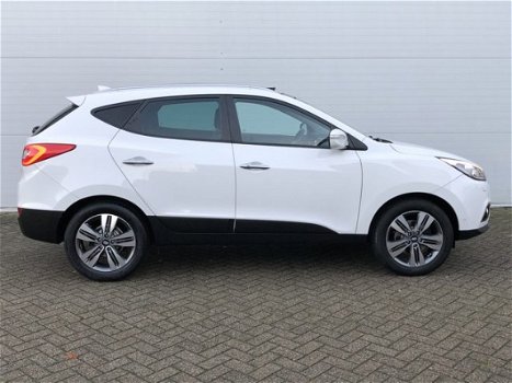 Hyundai ix35 - 2.0i 4WD i-Catcher Automaat RIJKLAAR panoramadak, zwart lederen bekleding, full map n - 1