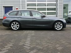 BMW 3-serie Touring - 328i High Executive * LEER*NAVIGATIE