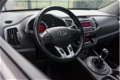 Kia Sportage - 1.7 CRDI X-ecutive Plus Pack / Viënna Leder/ Cruise Control/ Parkeersensoren/ Telefoo - 1 - Thumbnail