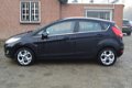 Ford Fiesta - 1.25 Titanium 5.Drs 1e eigenaar bj.2011 122.000 km airco lm.velgen radio/cd+usb+stuurb - 1 - Thumbnail