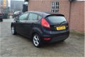 Ford Fiesta - 1.25 Titanium 5.Drs 1e eigenaar bj.2011 122.000 km airco lm.velgen radio/cd+usb+stuurb - 1 - Thumbnail