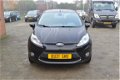 Ford Fiesta - 1.25 Titanium 5.Drs 1e eigenaar bj.2011 122.000 km airco lm.velgen radio/cd+usb+stuurb - 1 - Thumbnail