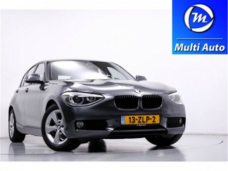 BMW 1-serie - 114i EDE Upgrade Edition Navigatie Leder Parkeersensoren Xenon 5-Deurs - 1