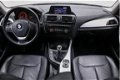 BMW 1-serie - 114i EDE Upgrade Edition Navigatie Leder Parkeersensoren Xenon 5-Deurs - 1 - Thumbnail