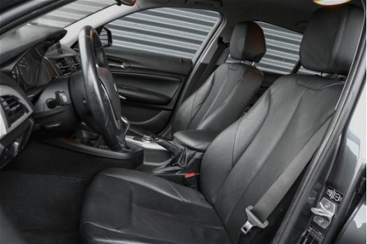 BMW 1-serie - 114i EDE Upgrade Edition Navigatie Leder Parkeersensoren Xenon 5-Deurs - 1