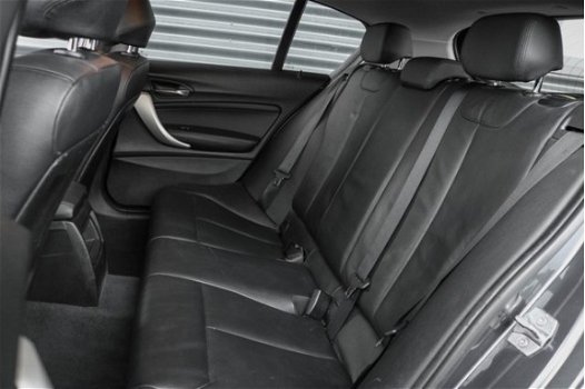 BMW 1-serie - 114i EDE Upgrade Edition Navigatie Leder Parkeersensoren Xenon 5-Deurs - 1