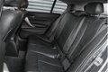 BMW 1-serie - 114i EDE Upgrade Edition Navigatie Leder Parkeersensoren Xenon 5-Deurs - 1 - Thumbnail