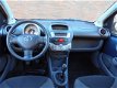 Toyota Aygo - 1.0-12V Comfort Elek. Pakket. Airco. 5-Deurs. 15'' LM - 1 - Thumbnail