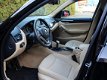 BMW X1 - sDrive18i High Executive Pano/Schuifdak Xenon Harman/Kardon - 1 - Thumbnail