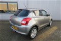 Suzuki Swift - 1.2 DualJet 90pk CVT Select AIRCO/ AUTOMAAT/ WINTERBANDEN - 1 - Thumbnail