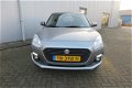 Suzuki Swift - 1.2 DualJet 90pk CVT Select AIRCO/ AUTOMAAT/ WINTERBANDEN - 1 - Thumbnail