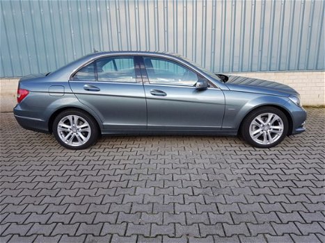 Mercedes-Benz C-klasse - 180 Business Class Avantgarde FACELIFT *NAVI *PDC *ORG 87.824 KM - 1