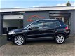 Volkswagen Tiguan - 1.4 TSI 150PK 4WD trekh navi NAP NL-auto - 1 - Thumbnail