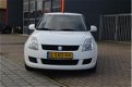 Suzuki Swift - 1.3 Comfort - 1 - Thumbnail