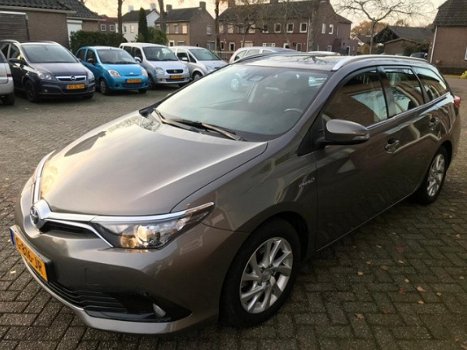 Toyota Auris Touring Sports - 1.8 Hybrid Executive navigatie - 1