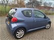 Toyota Aygo - 1.0-12V -1E EIGENAAR - 76.000KM - AIRCO - NETJES - 1 - Thumbnail