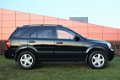 Kia Sorento - 3.3 V6 Automaat, Lederen interieur - 1 - Thumbnail