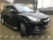 Hyundai ix35 - 2.0i Style Org.NL|Navi|Camera|Half leder - 1 - Thumbnail