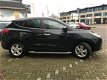 Hyundai ix35 - 2.0i Style Org.NL|Navi|Camera|Half leder - 1 - Thumbnail