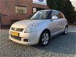 Suzuki Swift - 1.3 Exclusive ( Airco + Elektrische ramen ) - 1 - Thumbnail