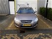 Kia Cee'd - 1.4 X-ecutive 1e eigenaar Beige - 1 - Thumbnail