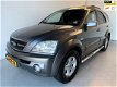 Kia Sorento - 2.5 CRDI Comfort HR 4x4 Airco Trekhaak grijs kenteken - 1 - Thumbnail