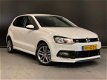 Volkswagen Polo - 1.2 TSI Edition R , Apple Carplay, Navi, R-Line, Clima, Cruise, PDC, NAP/NL Auto - 1 - Thumbnail