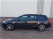 Opel Astra Sports Tourer - 2.0 CDTi Edition Navigatie, PDC, Airco, Cruise control - 1 - Thumbnail