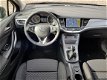 Opel Astra - 1.0 Edition Navigatie, PDC, Airco, Cruise control, Telefoonvoorbereiding - 1 - Thumbnail