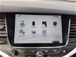 Opel Astra - 1.0 Edition Navigatie, PDC, Airco, Cruise control, Telefoonvoorbereiding - 1 - Thumbnail