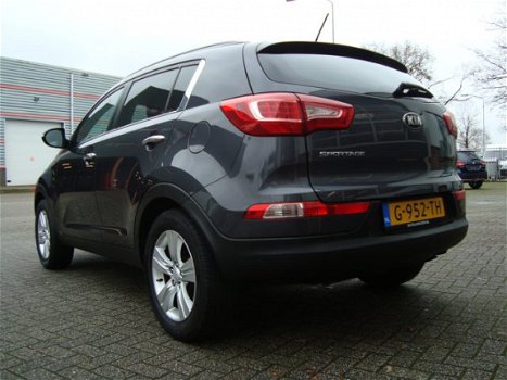 Kia Sportage - PLUS PACK SUV HOGE INSTAP NAVIGATIE CAMERA XENON LED CRUISE HALF LEDER LMV FABR. GARA - 1