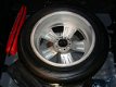 Kia Sportage - PLUS PACK SUV HOGE INSTAP NAVIGATIE CAMERA XENON LED CRUISE HALF LEDER LMV FABR. GARA - 1 - Thumbnail