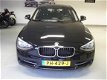BMW 1-serie - 120d High Executive Navi Parctronic Stoel en stuurverwarming - 1 - Thumbnail